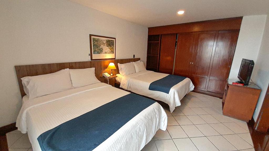 Travelers Apartamentos & Suites Conjunto Plenitud — foto 1